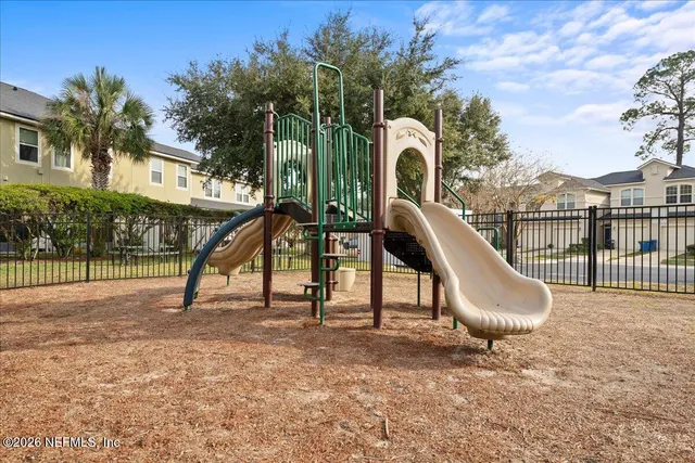 a view of a house with a park