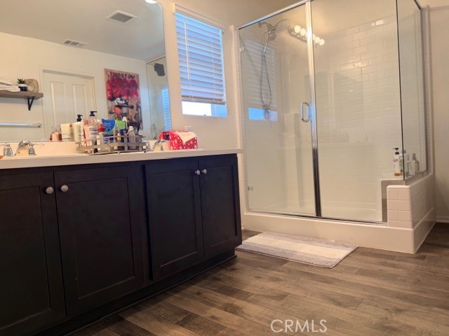 29451 Beeler Road Winchester, CA 92596 - Photo 12 of 19 a bathroom with a double vanity sink mirror and shower