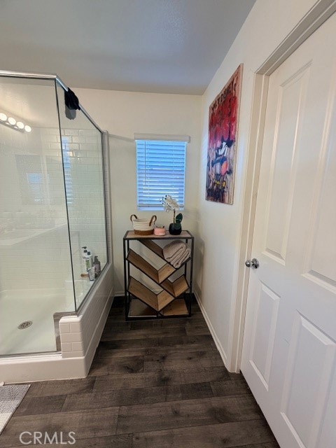 29451 Beeler Road Winchester, CA 92596 - Photo 14 of 19 a room with wooden floor and furniture