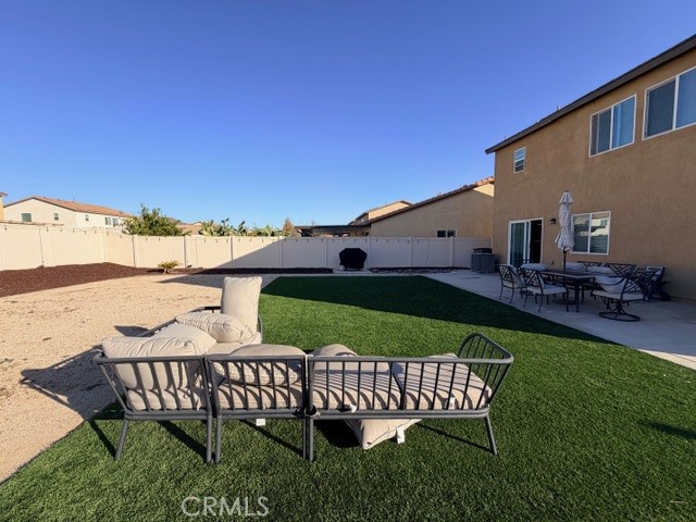 29451 Beeler Road Winchester, CA 92596 - Photo 17 of 19 a view of a chair and tables in the backyard