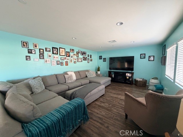 29451 Beeler Road Winchester, CA 92596 - Photo 6 of 19 a living room with furniture and a flat screen tv