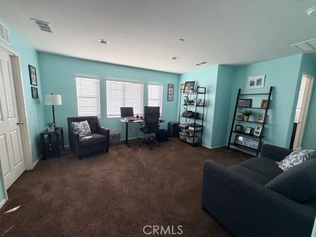 29451 Beeler Road Winchester, CA 92596 - Photo 8 of 19 a living room with furniture and a large window