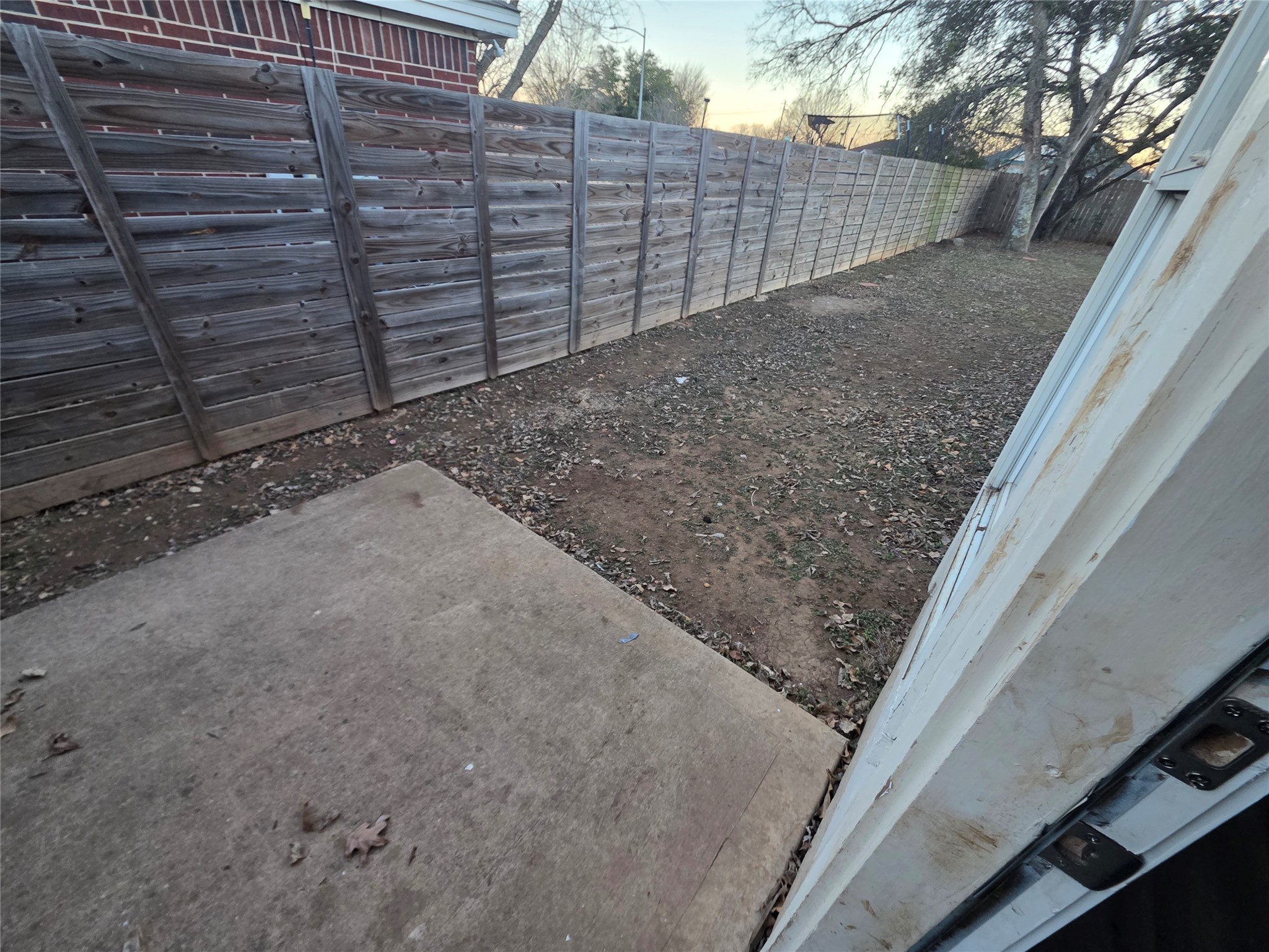 4417 Lendall Lane Austin, TX 78744 - Photo 15 of 23 a view of a backyard