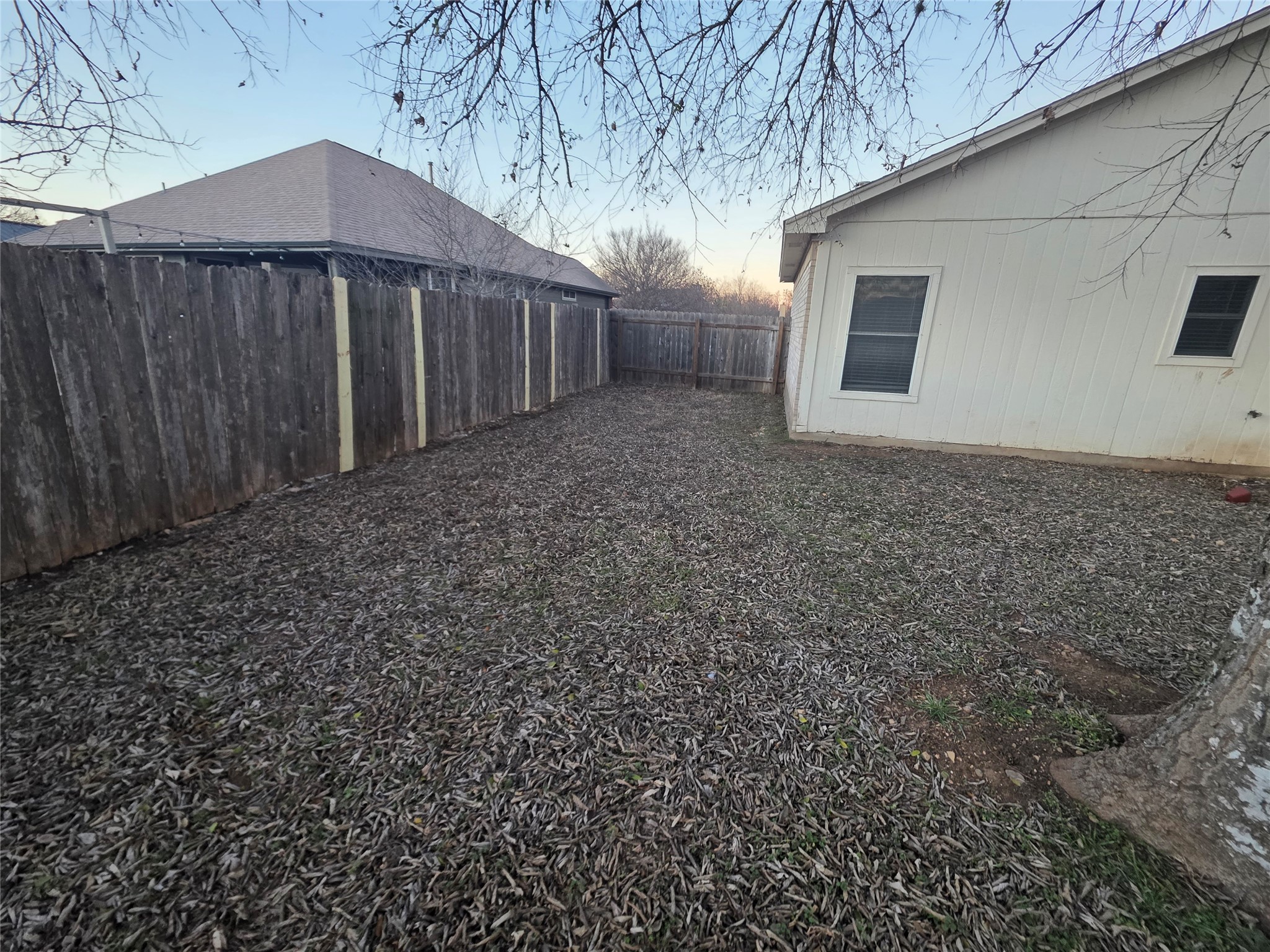 4417 Lendall Lane Austin, TX 78744 - Photo 17 of 23 a backyard of a house