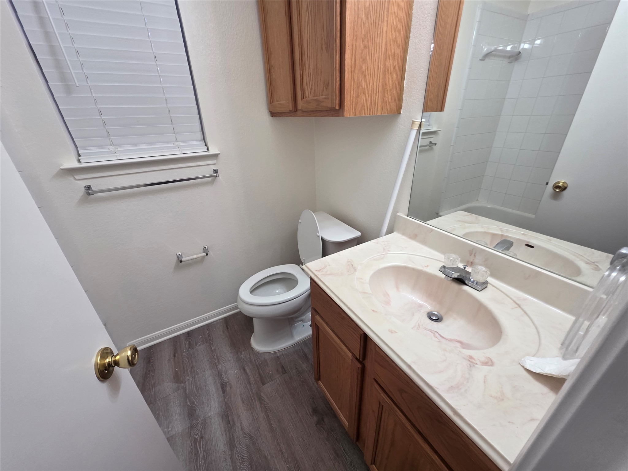 4417 Lendall Lane Austin, TX 78744 - Photo 5 of 23 a bathroom with a sink and a toilet