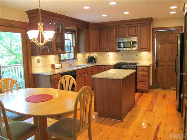 1412 Dellwood Drive Raleigh, NC 27607 - Photo 11 of 22 Kitchen and Breakfast, Open to Deck.