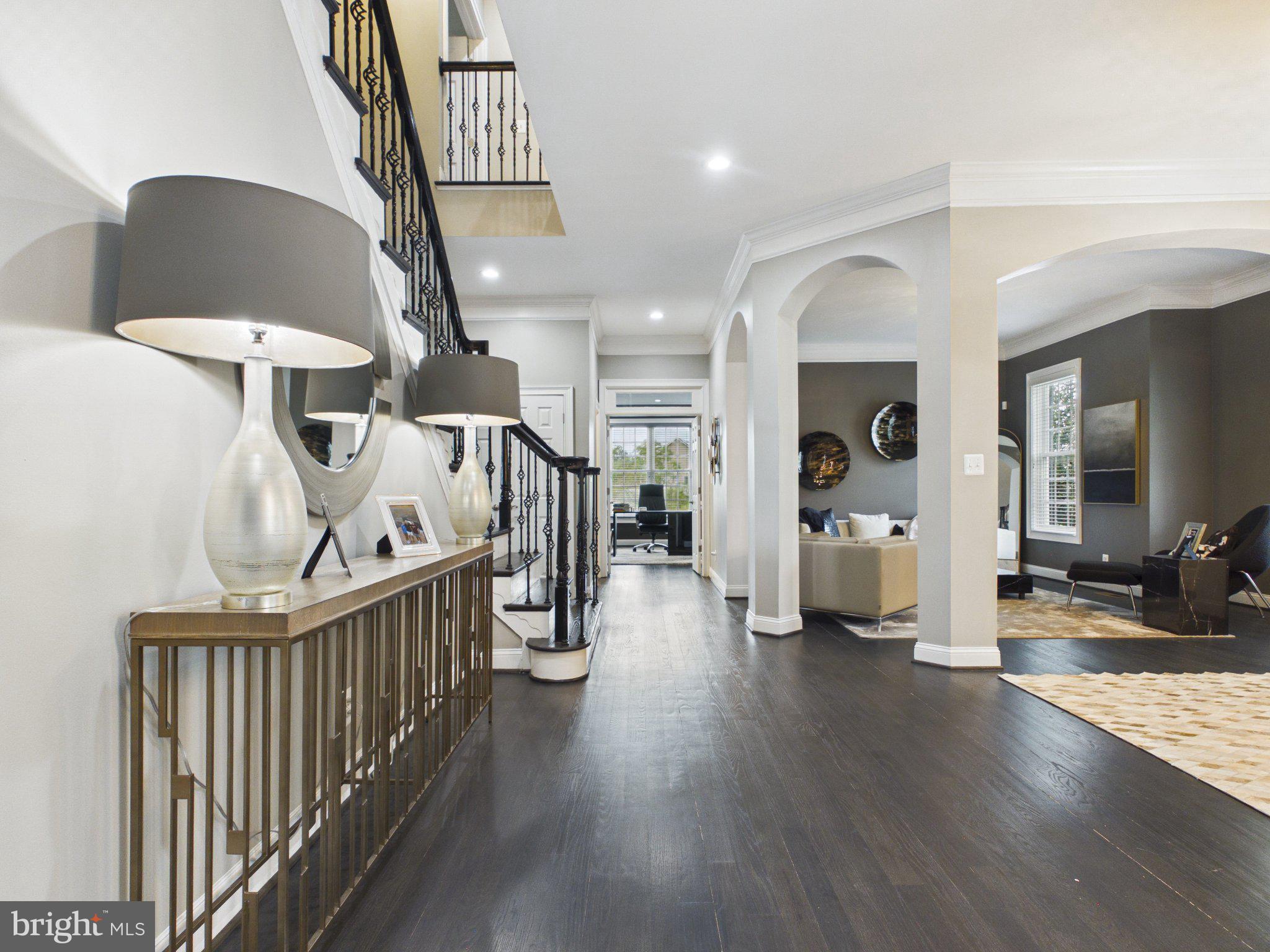 38565 Piggott Bottom Road Hamilton, VA 20158 - Photo 4 of 85 a view of a hallway with dining room and wooden floor