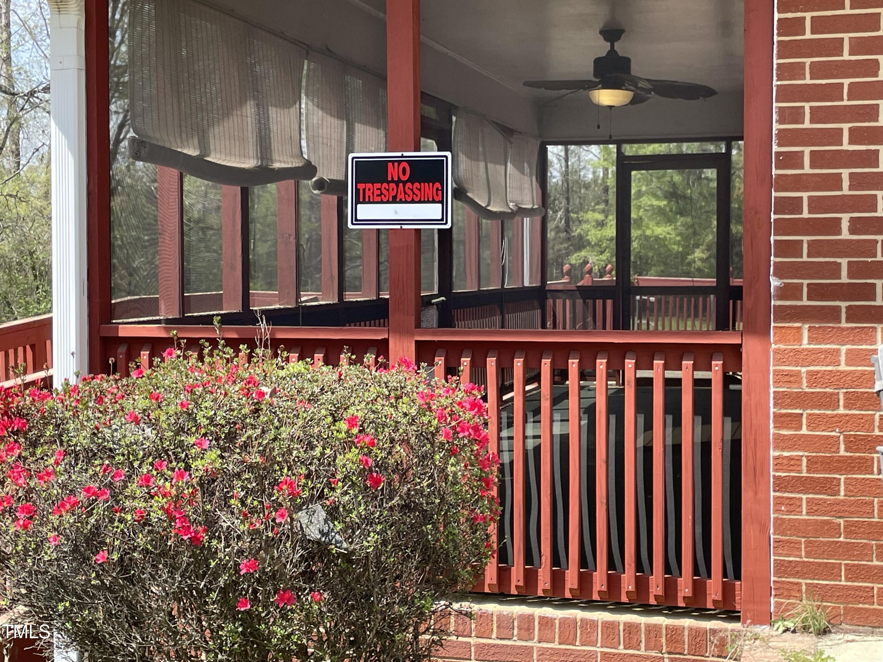 3311 Redwood Road Durham, NC 27704 - Photo 13 of 32 a bunch of flowers in a balcony
