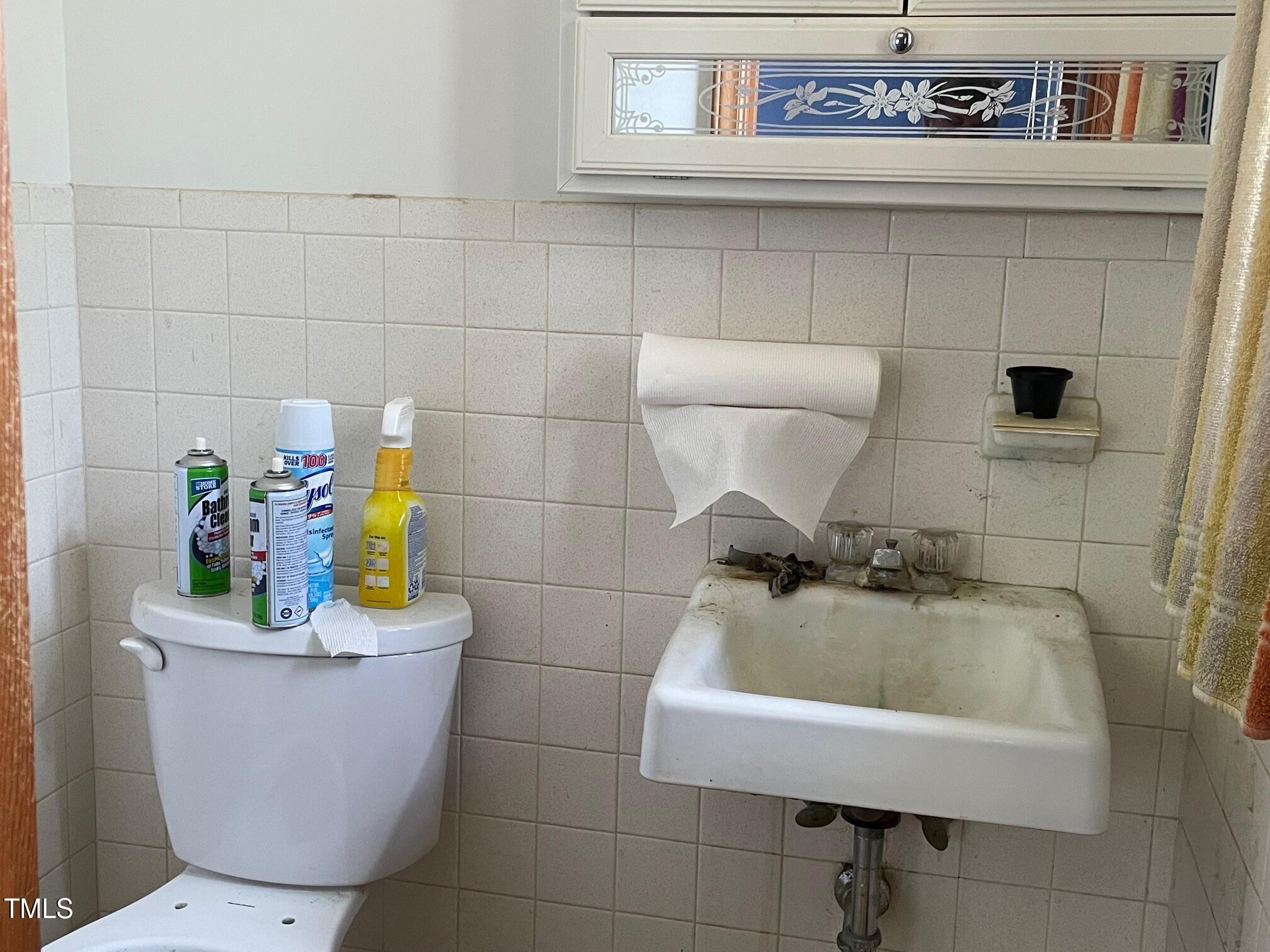 3311 Redwood Road Durham, NC 27704 - Photo 21 of 32 a bathroom with a sink