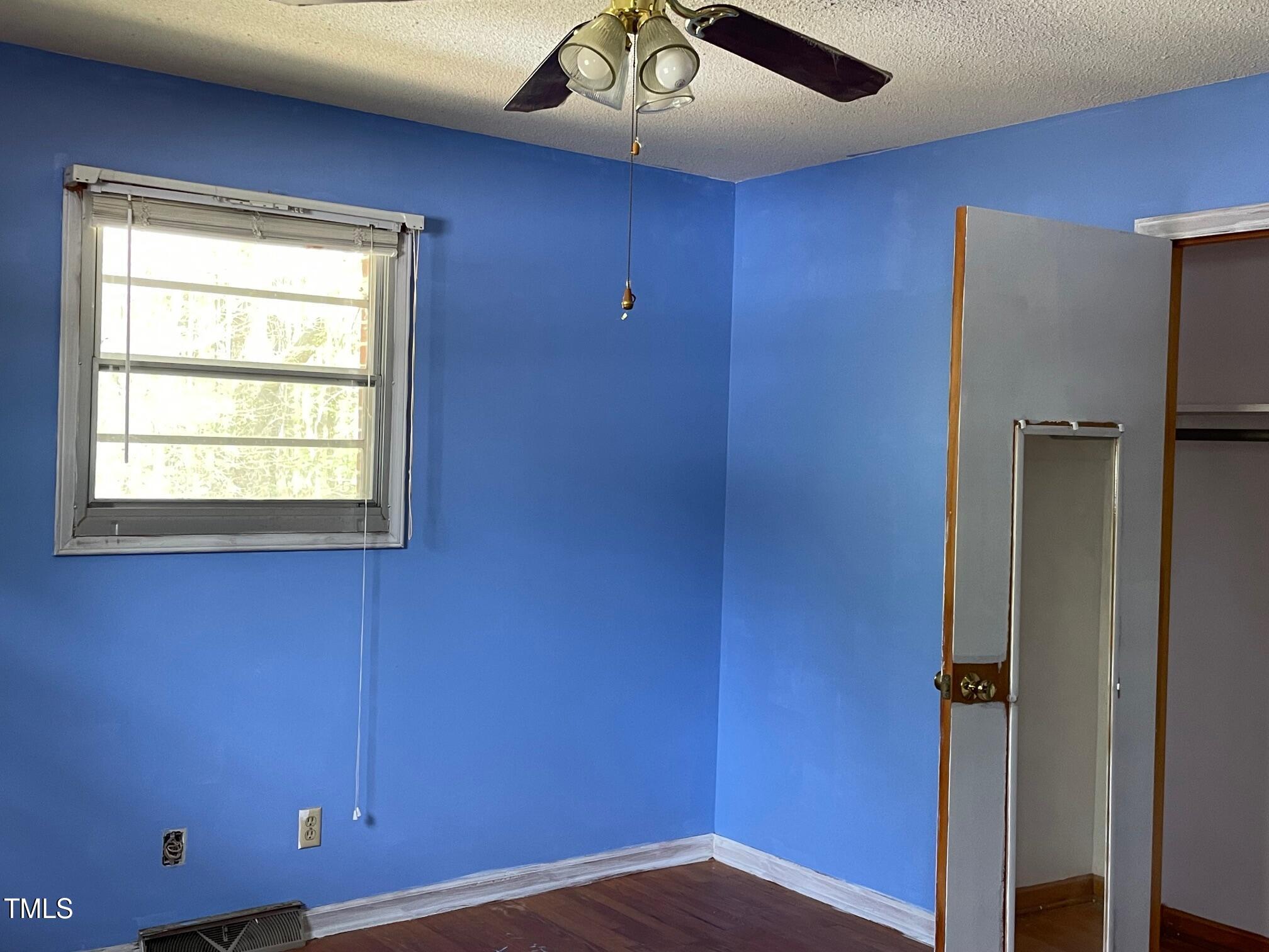 3311 Redwood Road Durham, NC 27704 - Photo 23 of 32 a view of an empty room with a window