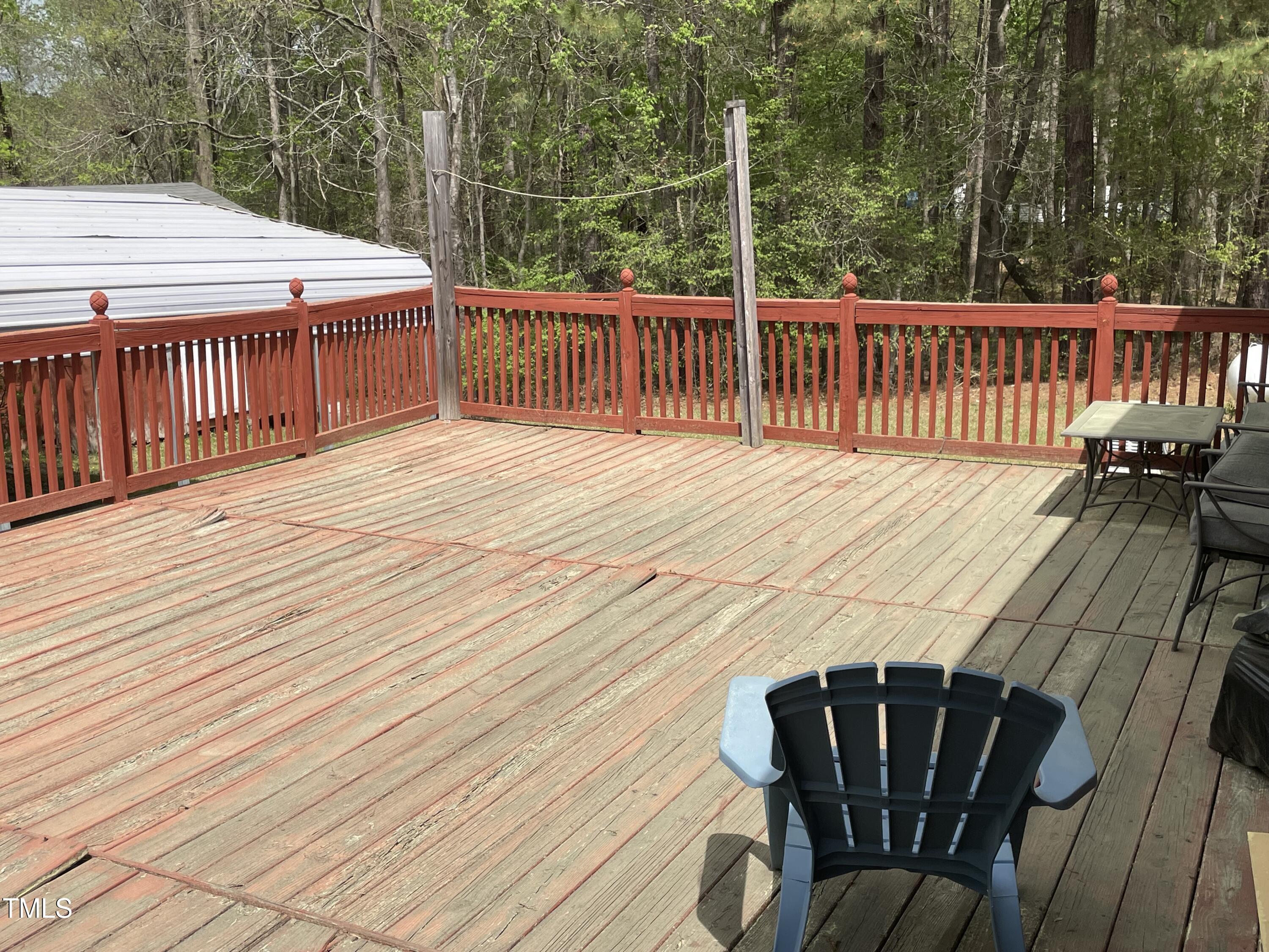 3311 Redwood Road Durham, NC 27704 - Photo 7 of 32 a view of a wooden deck