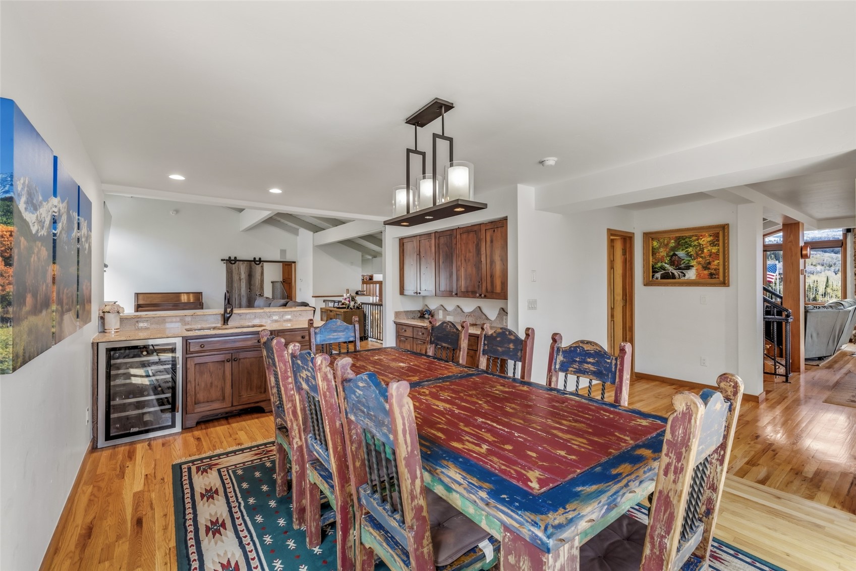 31775 Bradley Ranch Steamboat Springs, CO 80487 - Photo 44 of 49 a dining room with furniture and wooden floor