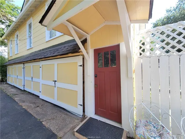a view of a house with a wooden door