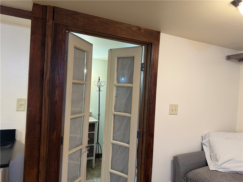 601 East 30th Street, Unit B Bryan, TX 77803 - Photo 7 of 15 a living room with furniture and a window