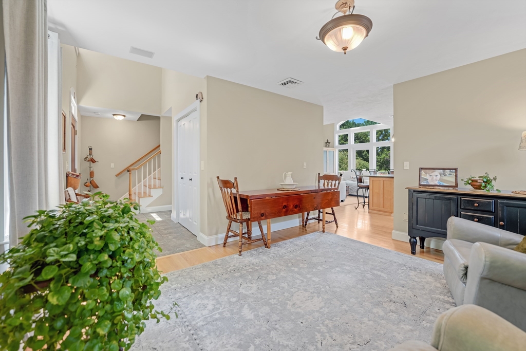 57 Perry Hill Road Acushnet, MA 02743 - Photo 21 of 40 a living room with furniture and a large window