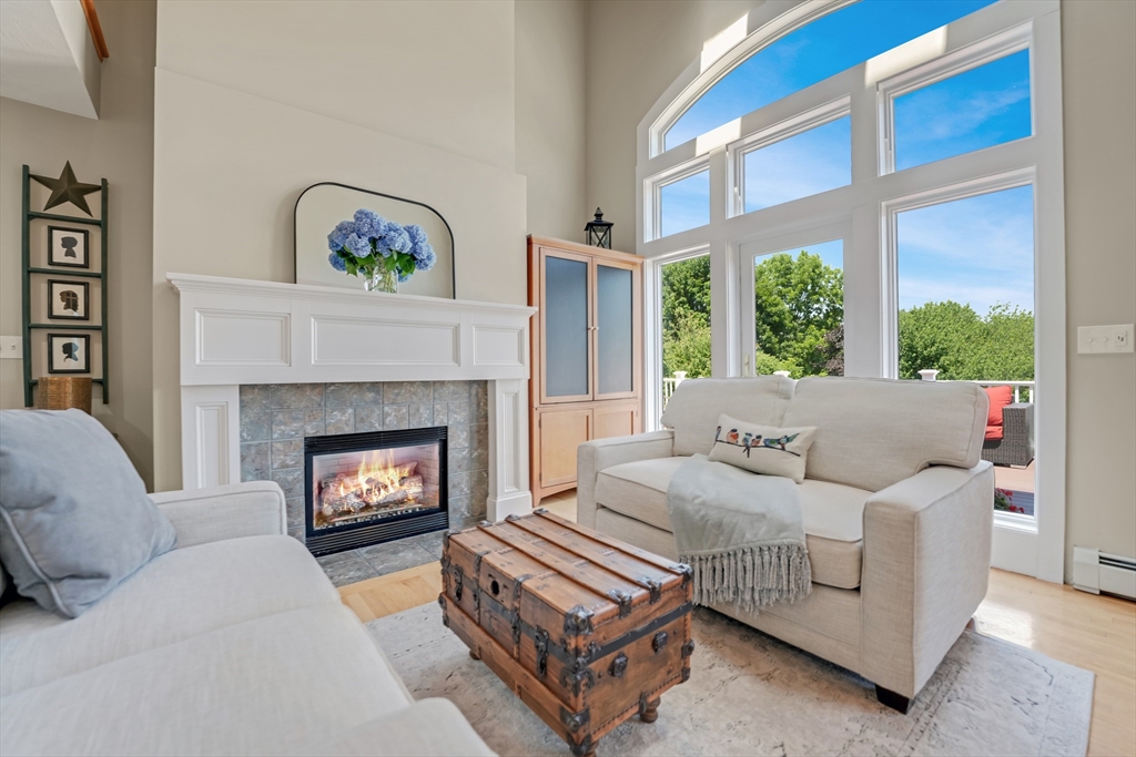57 Perry Hill Road Acushnet, MA 02743 - Photo 7 of 40 a living room with furniture and a fireplace