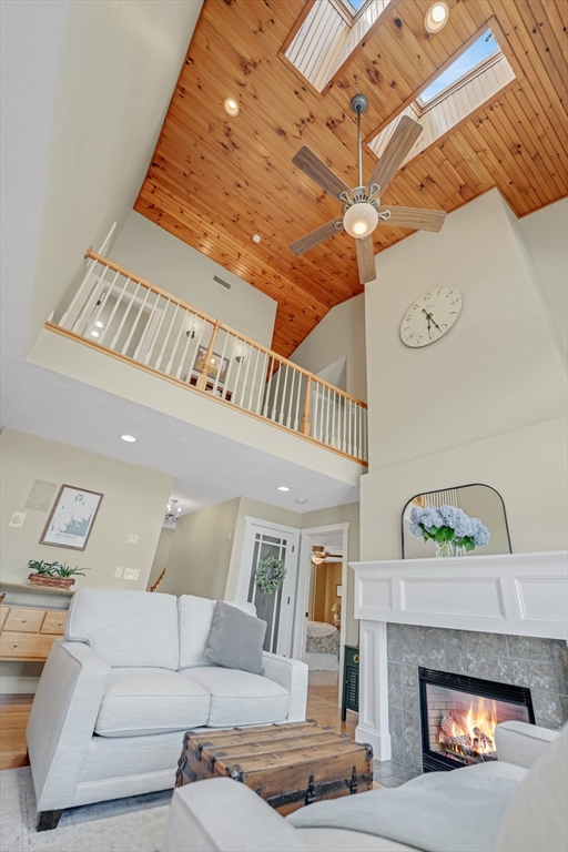 57 Perry Hill Road Acushnet, MA 02743 - Photo 9 of 40 a living room with furniture and a fireplace