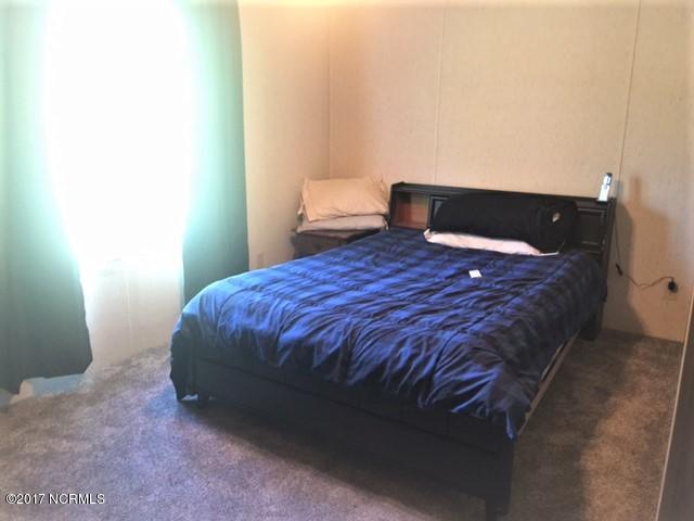 7454 Fish Pond Road Sims, NC 27880 - Photo 12 of 17 New Carpet, Walk in closet