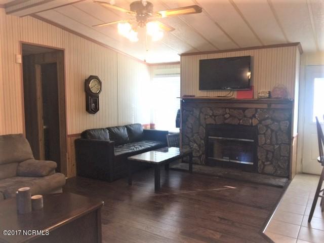 7454 Fish Pond Road Sims, NC 27880 - Photo 7 of 17 Stone Fireplace w/ Gas Logs