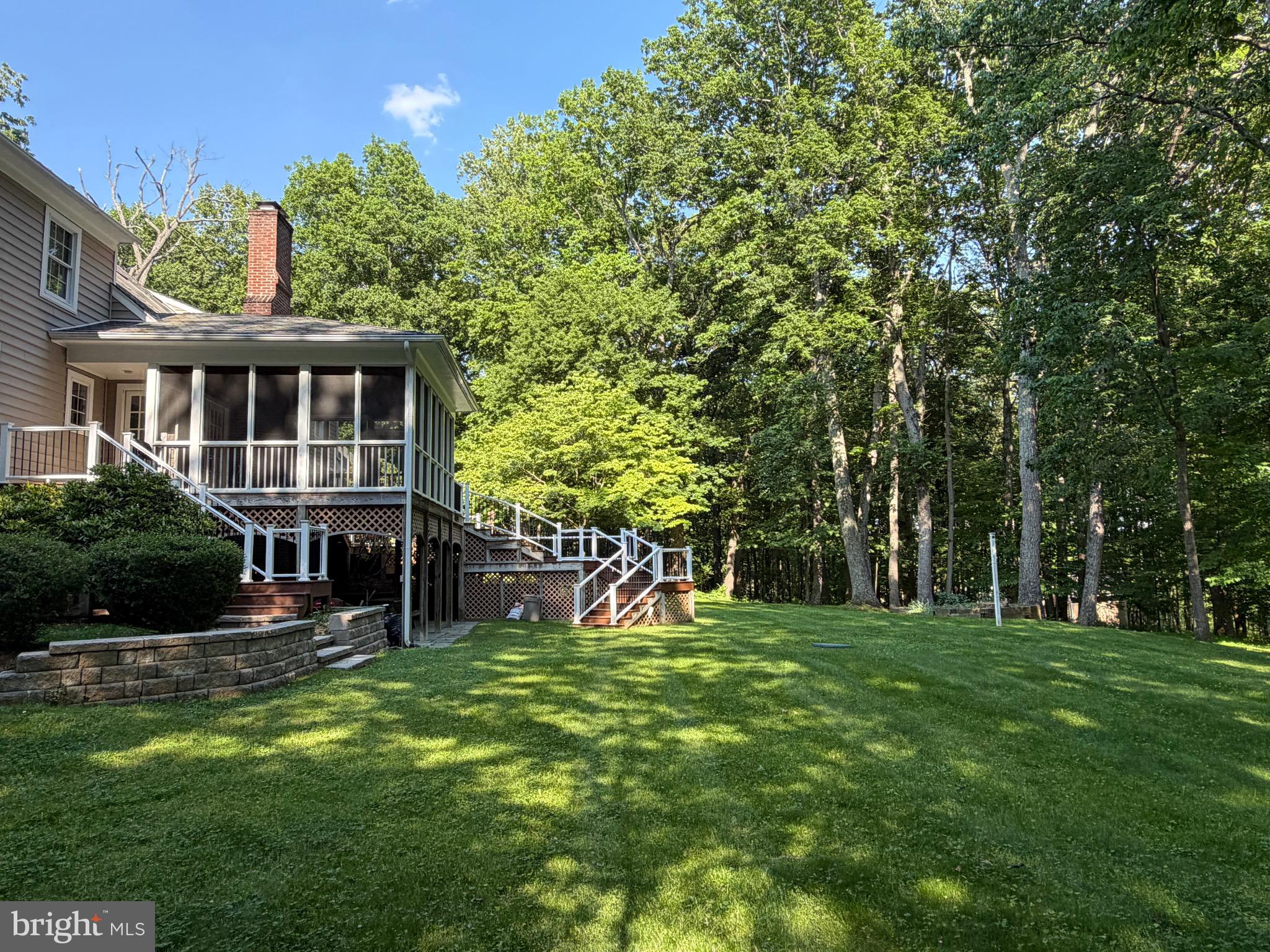 7530 Damascus Road Gaithersburg, MD 20882 - Photo 7 of 12 a view of a house with a yard