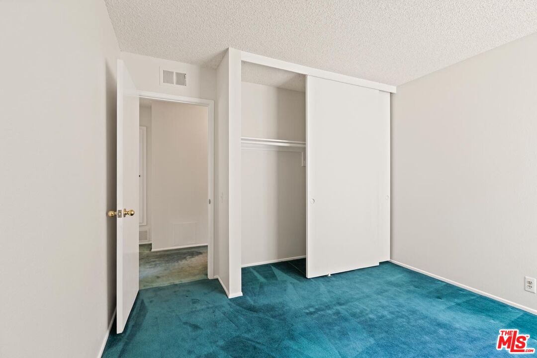 106 Sequoia Tree Lane Irvine, CA 92612 - Photo 12 of 36 a view of an empty room with closet area
