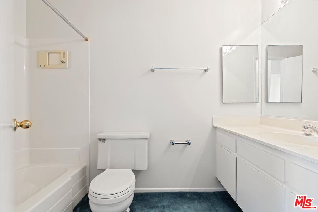 106 Sequoia Tree Lane Irvine, CA 92612 - Photo 14 of 36 a bathroom with a sink a toilet and shower