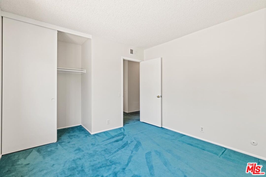 106 Sequoia Tree Lane Irvine, CA 92612 - Photo 16 of 36 a view of an empty room with closet