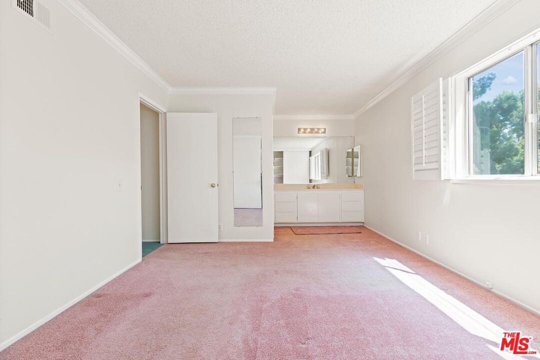 106 Sequoia Tree Lane Irvine, CA 92612 - Photo 18 of 36 an empty room with windows