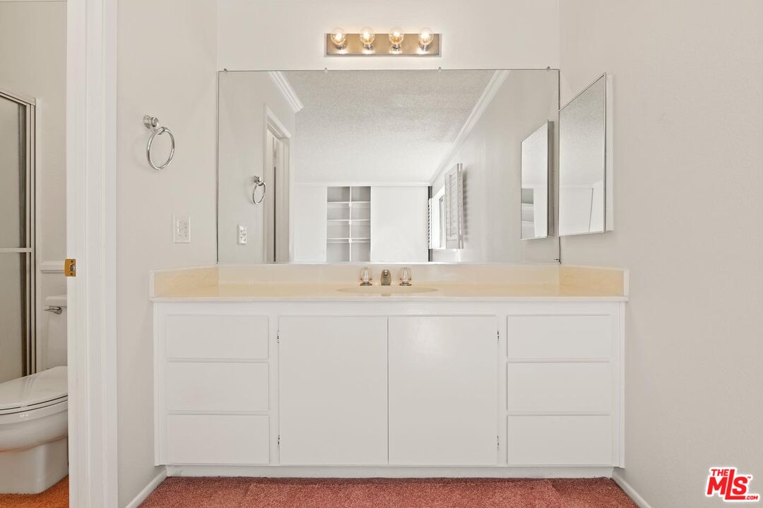 106 Sequoia Tree Lane Irvine, CA 92612 - Photo 20 of 36 a bathroom with a sink and a mirror