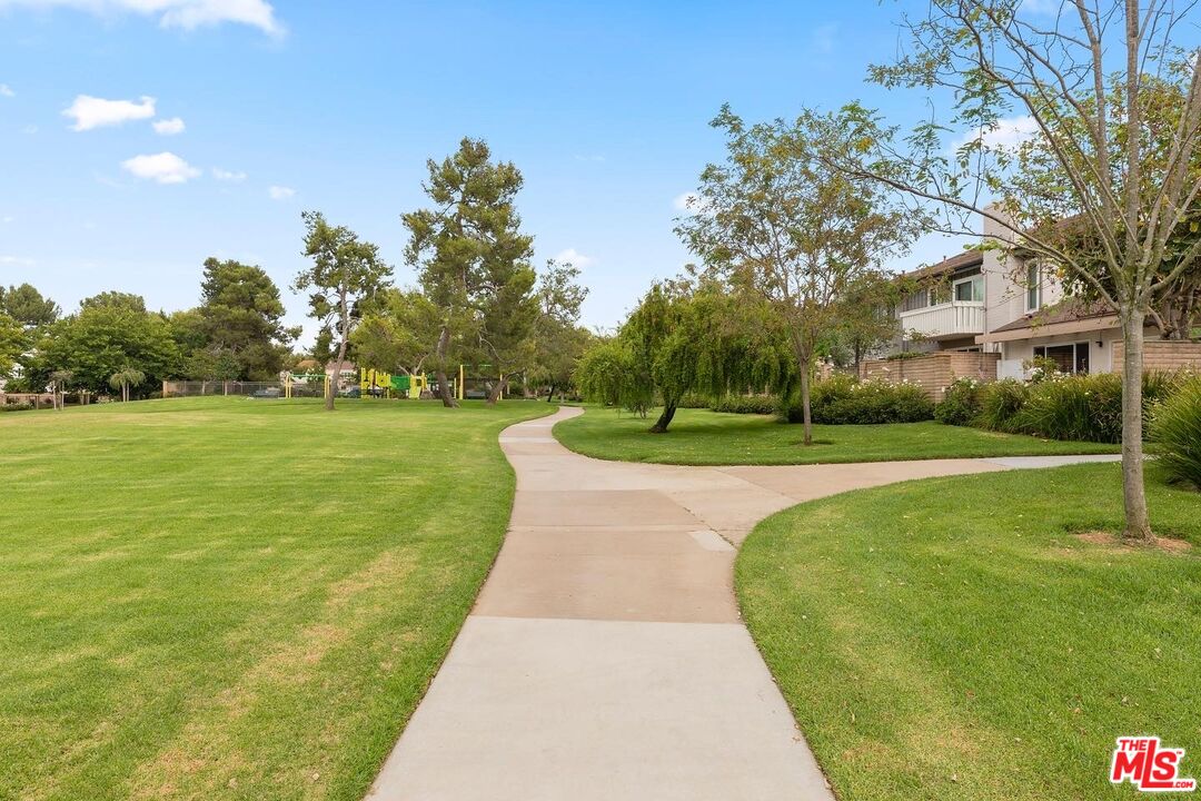 106 Sequoia Tree Lane Irvine, CA 92612 - Photo 30 of 36 a view of swimming pool with a garden and trees
