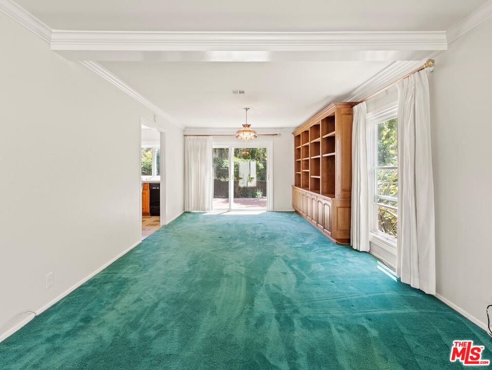 106 Sequoia Tree Lane Irvine, CA 92612 - Photo 4 of 36 a view of an empty room with a window and hardwood