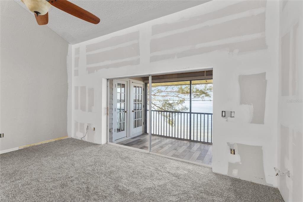 3840 Mariners Way, Unit 525 Cortez, FL 34215 - Photo 18 of 48 an empty room with windows