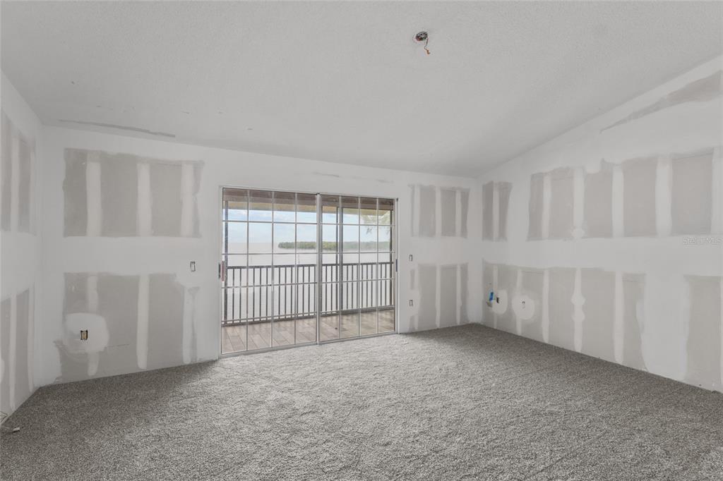 3840 Mariners Way, Unit 525 Cortez, FL 34215 - Photo 26 of 48 a view of an empty room with a window