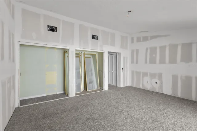 a bathroom with a shower and toilet