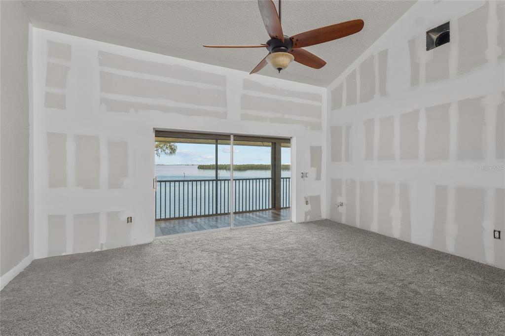 3840 Mariners Way, Unit 525 Cortez, FL 34215 - Photo 28 of 48 a view of an empty room with a window