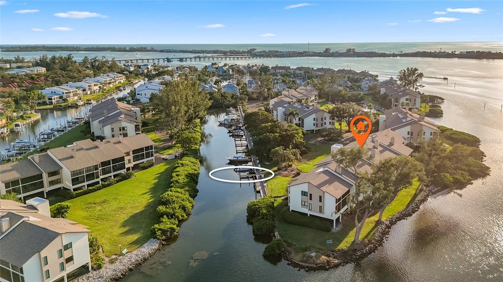 3840 Mariners Way, Unit 525 Cortez, FL 34215 - Photo 3 of 48 an aerial view of a house with a ocean view