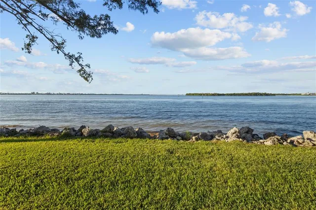 an aerial view of a house with outdoor space pool seating area and yard