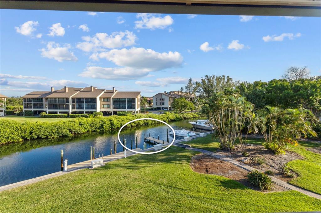 3840 Mariners Way, Unit 525 Cortez, FL 34215 - Photo 4 of 48 a swimming pool with outdoor seating and yard