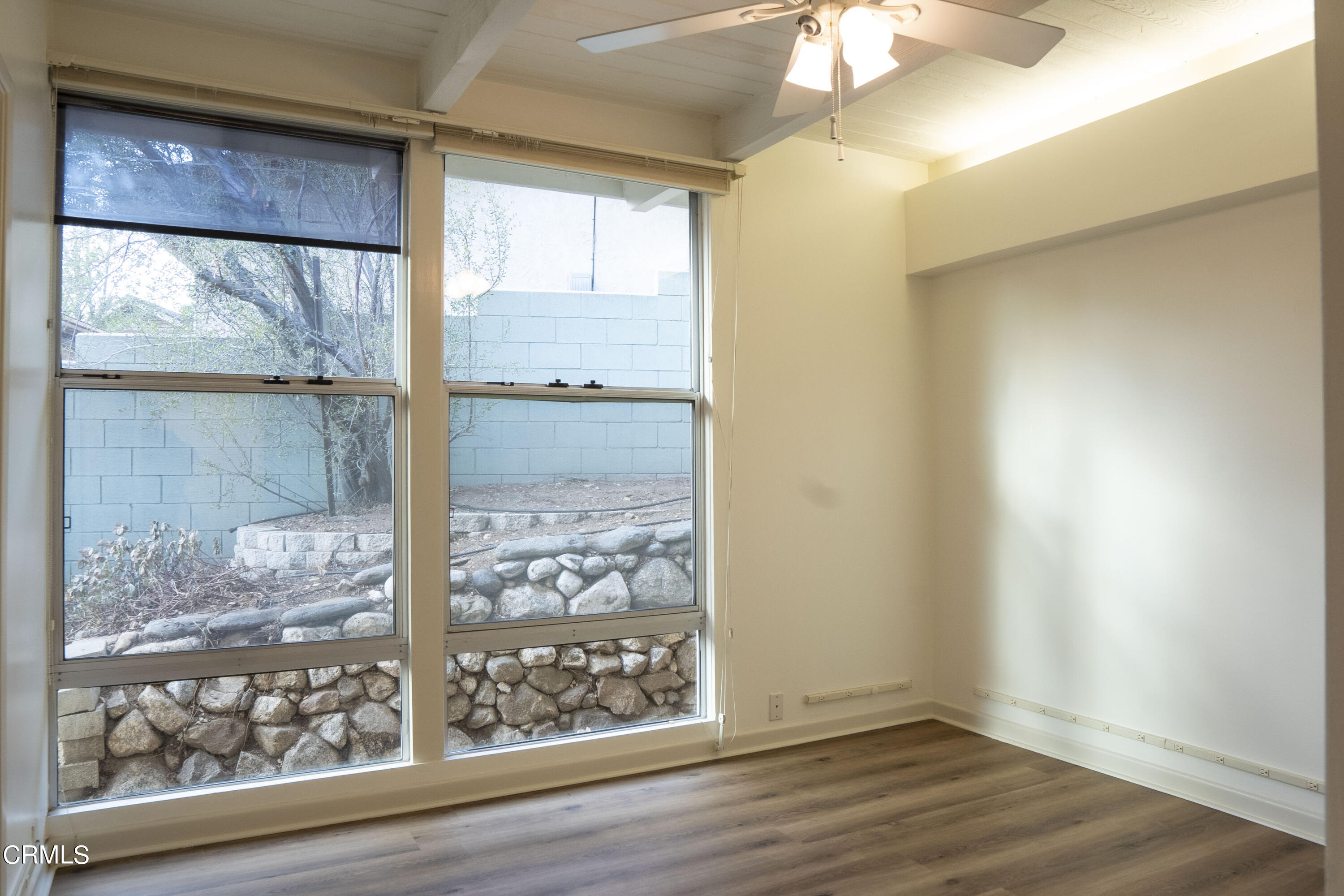 4017 Canyon Dell Drive Altadena, CA 91001 - Photo 13 of 28 a view of a room with wooden floor and door