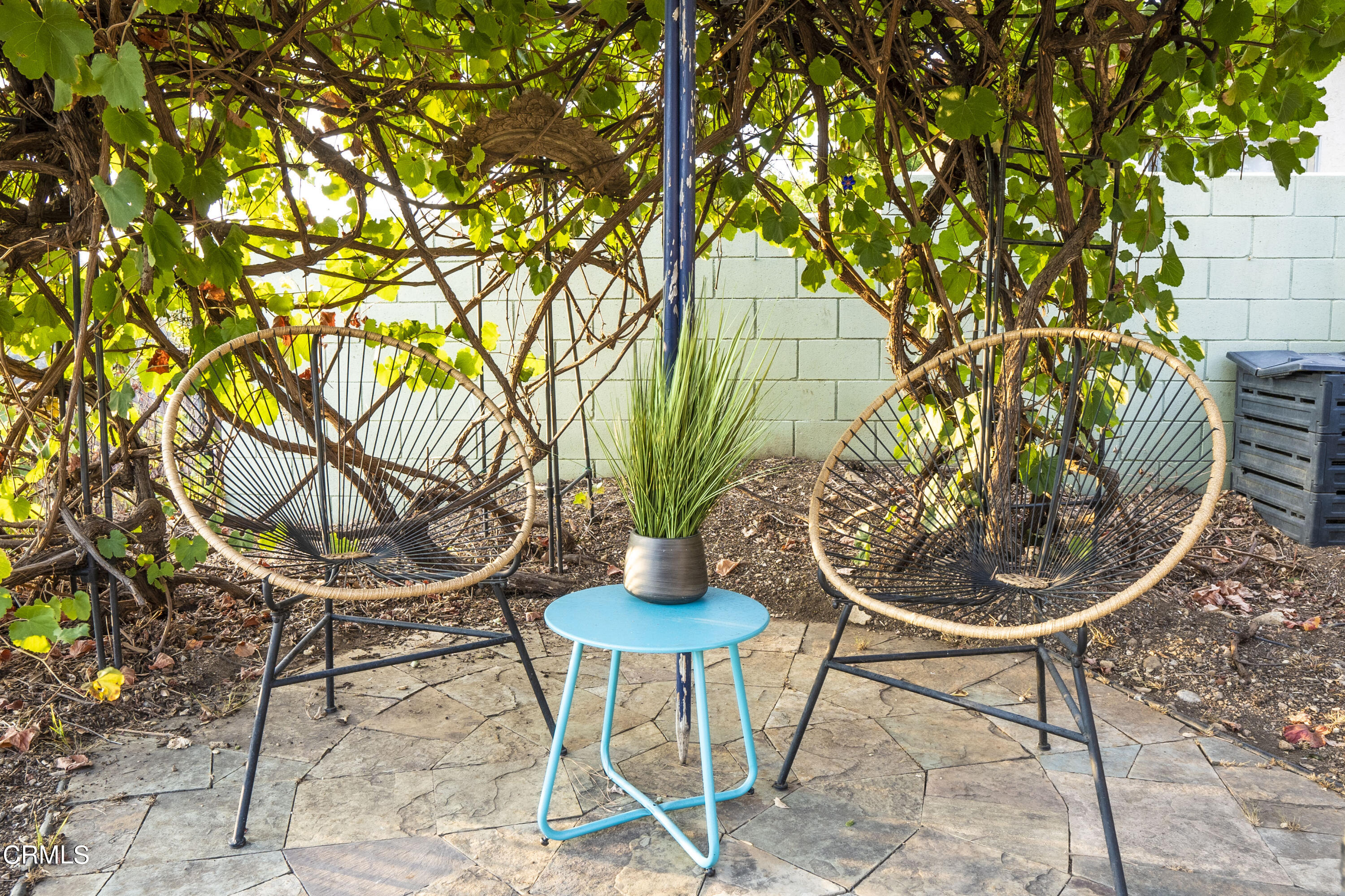 4017 Canyon Dell Drive Altadena, CA 91001 - Photo 16 of 28 a table and chairs in a vase