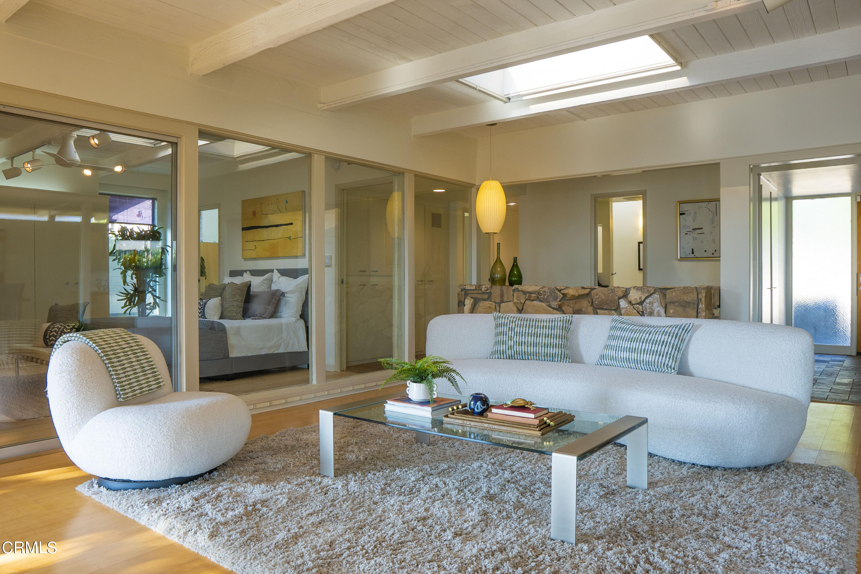 4017 Canyon Dell Drive Altadena, CA 91001 - Photo 3 of 28 a living room with furniture and a wooden floor