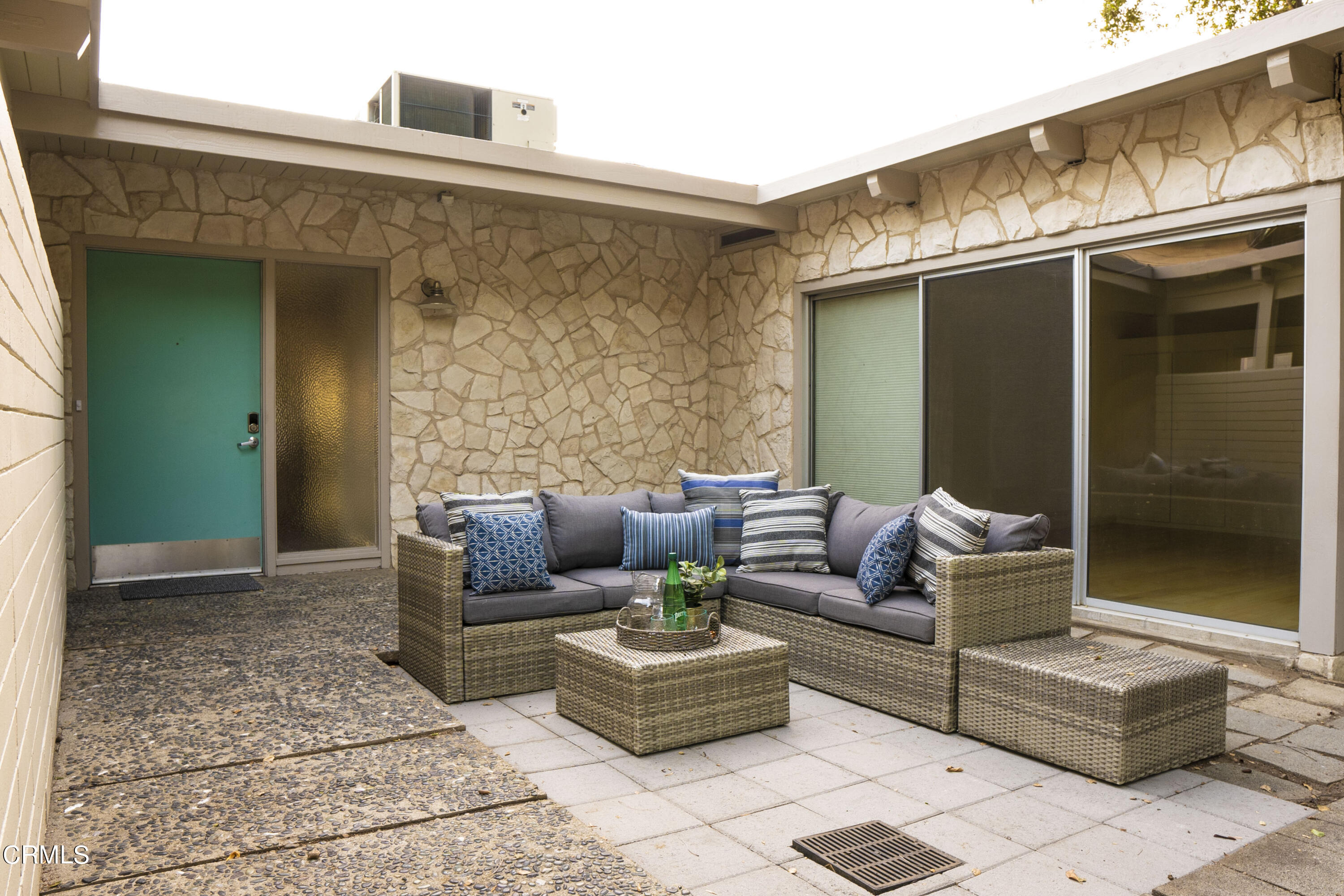 4017 Canyon Dell Drive Altadena, CA 91001 - Photo 22 of 28 a outdoor living space with furniture and a potted plant