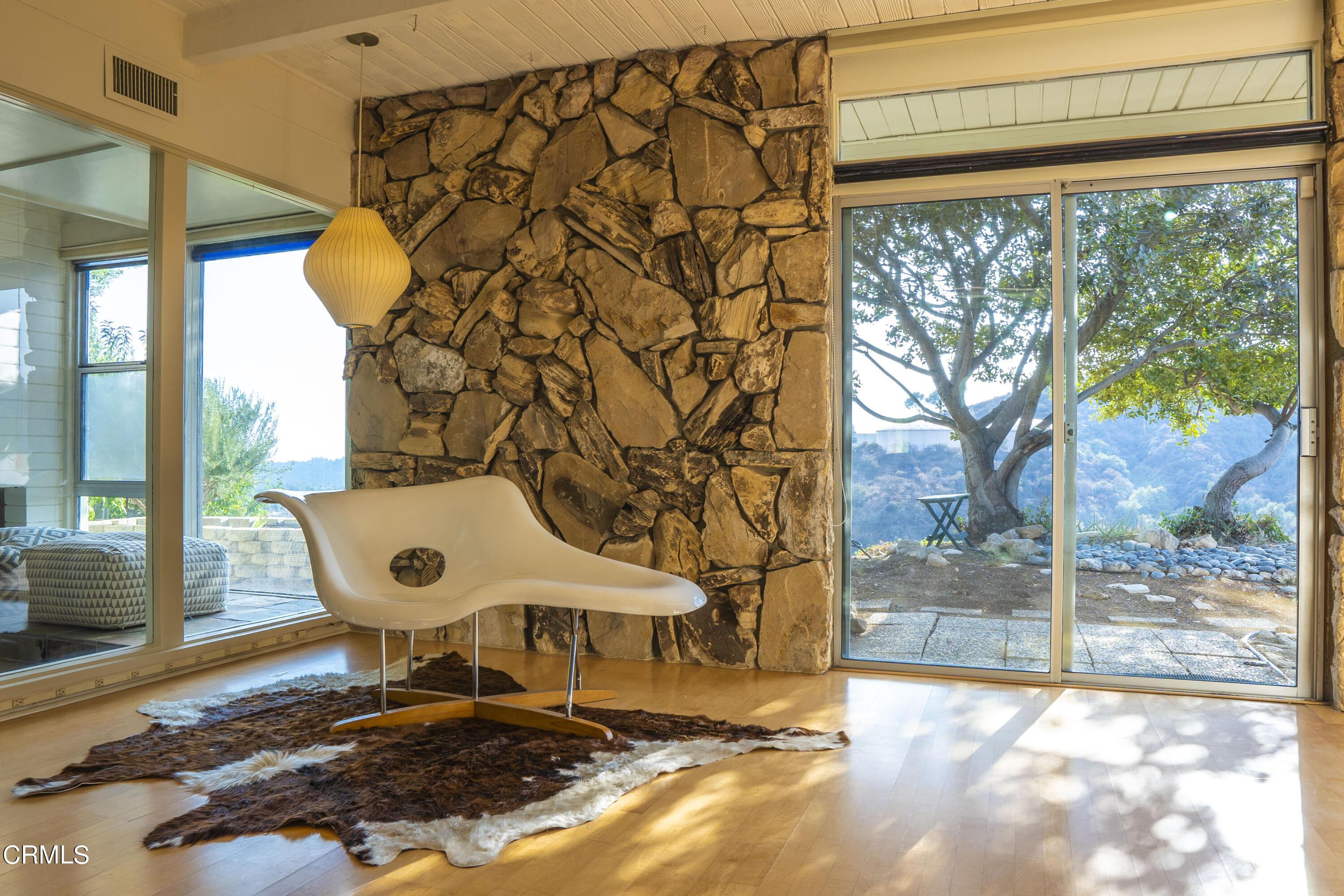 4017 Canyon Dell Drive Altadena, CA 91001 - Photo 4 of 28 a view of a two chairs in the patio and backyard