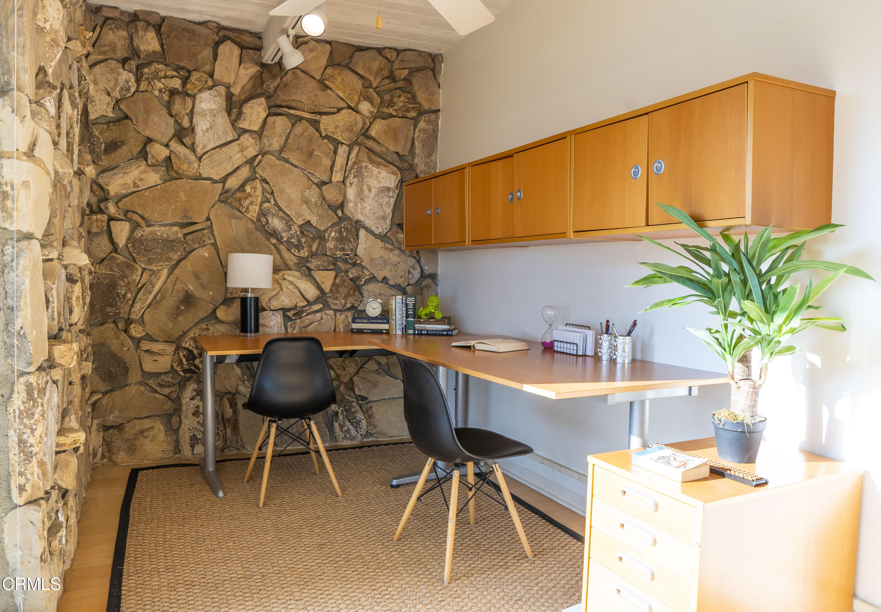 4017 Canyon Dell Drive Altadena, CA 91001 - Photo 5 of 28 a dining room with furniture and a potted plant