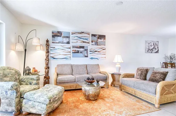 a living room with furniture and a couch