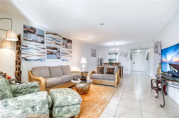 a living room with furniture and a couch