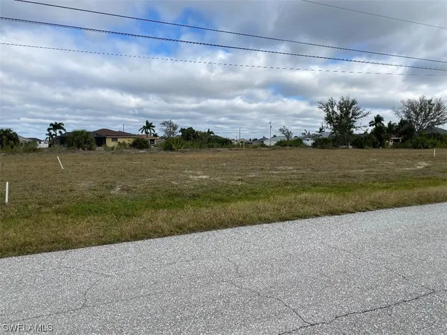 a view of a lake with a big yard