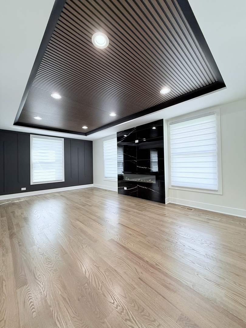 1581 Groton Lane Wheaton, IL 60189 - Photo 2 of 15 a view of empty room with wooden floor