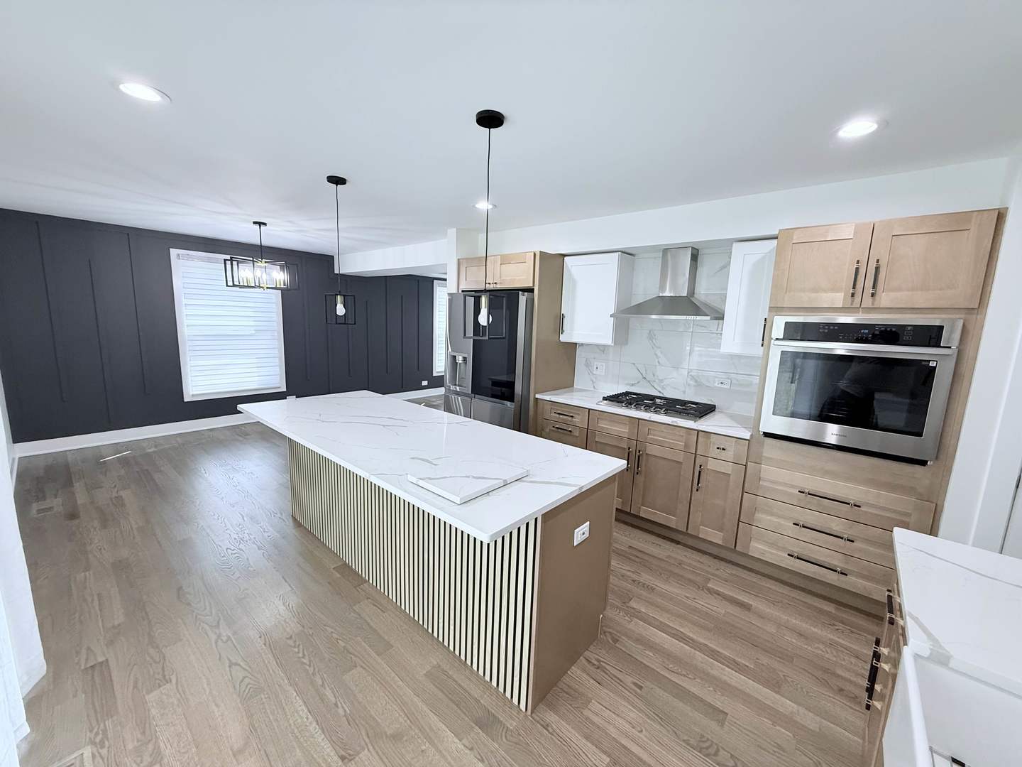1581 Groton Lane Wheaton, IL 60189 - Photo 4 of 15 a kitchen with granite countertop a stove top oven a sink dishwasher and a refrigerator with wooden floor