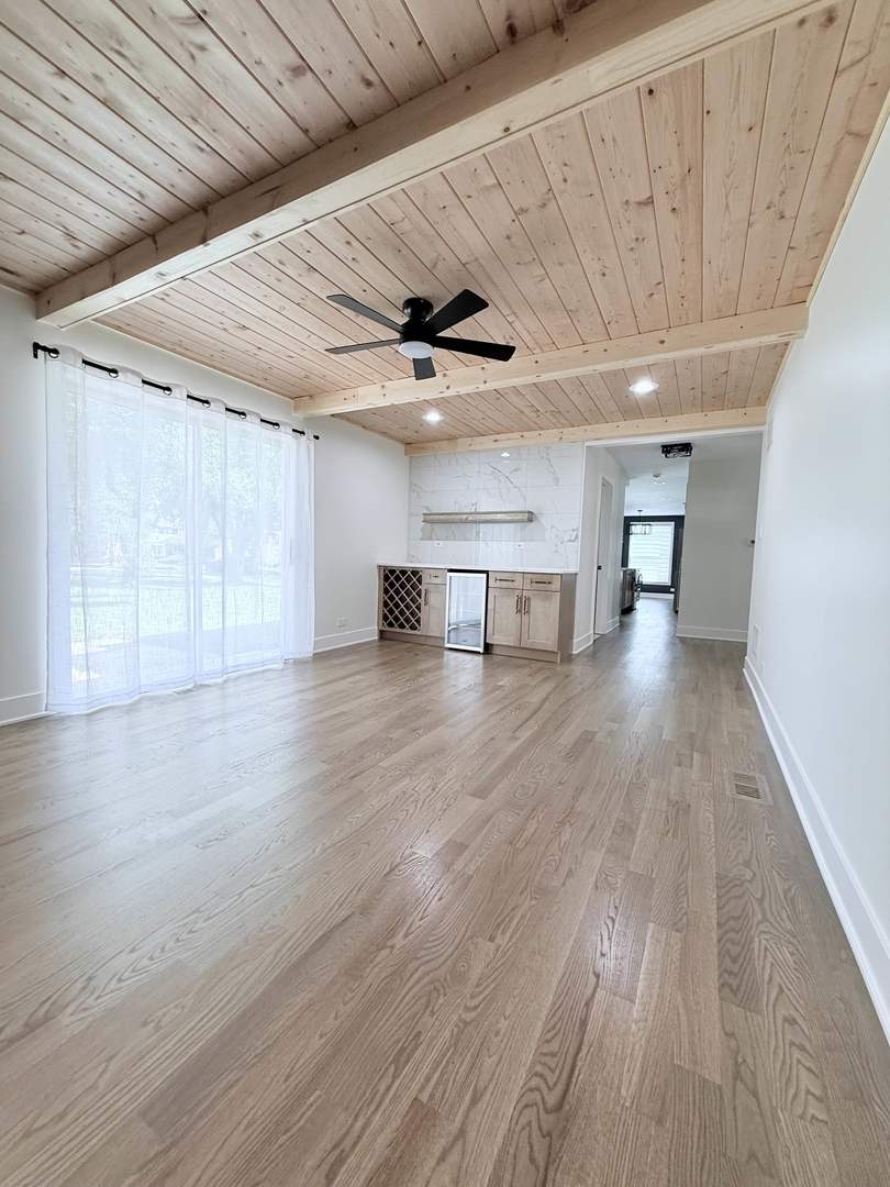 1581 Groton Lane Wheaton, IL 60189 - Photo 7 of 15 a view of empty room with wooden floor